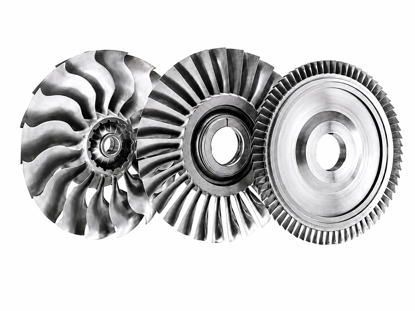 Three precision 5-axis machined titanium turbine discs and bladed components for aircraft jet engines on a white background.