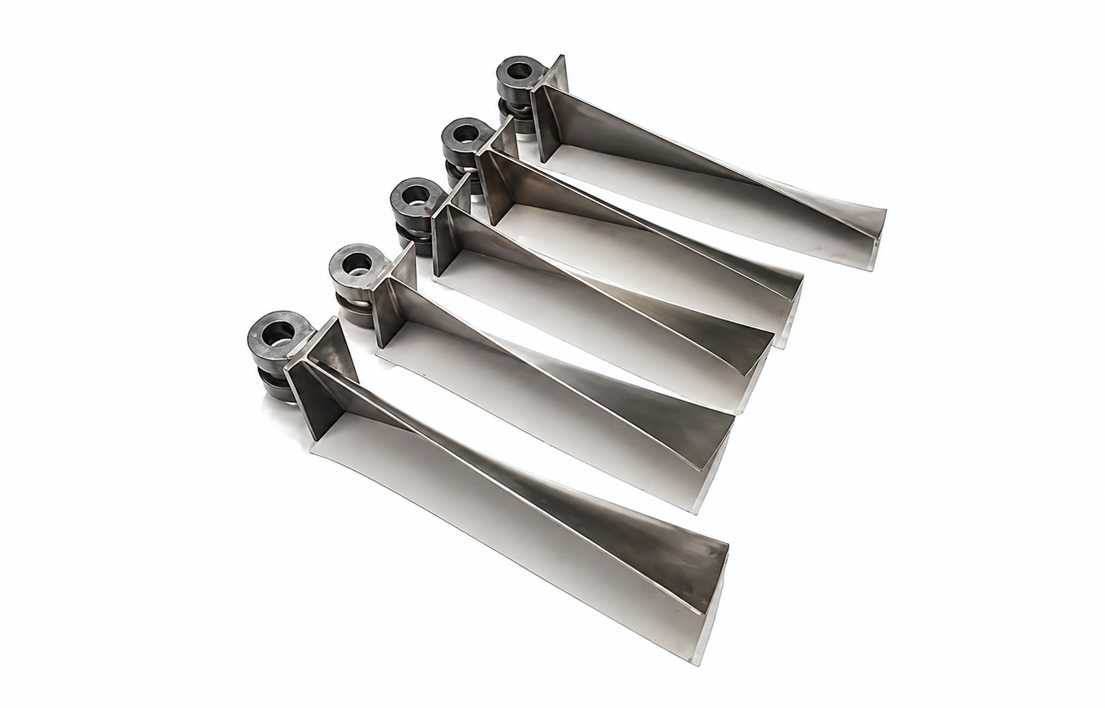 Precision-machined titanium jet engine turbine blades for aerospace aircraft applications on a white background